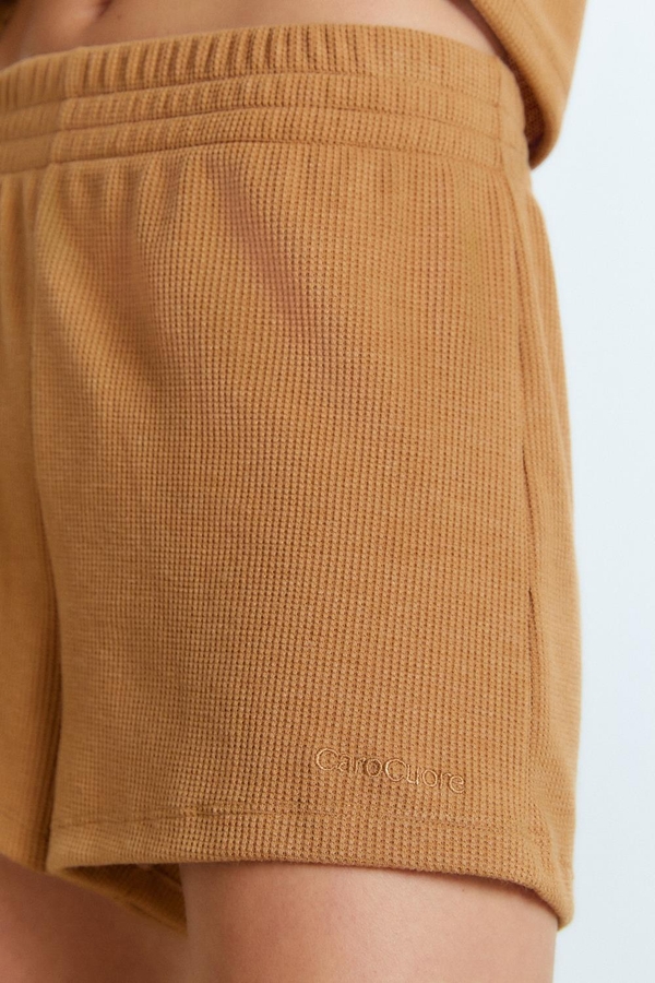pijama almendra